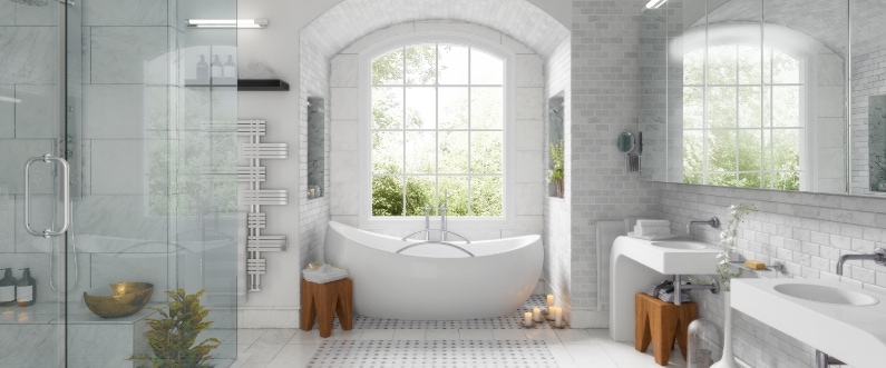 photo of a staged, large bathroom with a window overlooking the tub